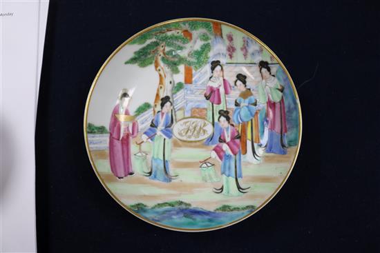 A Cantonese porcelain tea bowl and saucer, with gilt painted European monograms